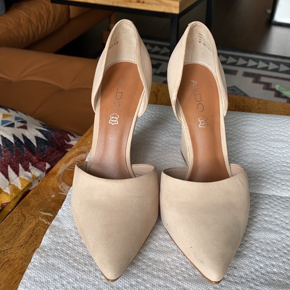 One scuff on the heel but pretty good condition. Only worn once at a wedding.